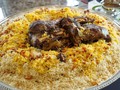 How does Saudi cuisine differ from the cuisine of neighboring countries?