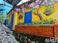 Красивые фрески в деревне Ньонли в городе Куиньон провинции Биньдинь