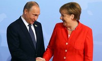   Nucléaire iranien: Poutine et Merkel favorables au maintien de l'accord 