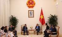 Vuong Dinh Huê reçoit l’envoyé commercial de la Première ministre britannique