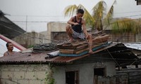 Massive storms devastate US, Philippines