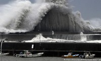 Powerful storms hit US, Japan