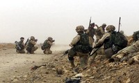 US retaliates in Iraq after three US troops wounded in attack