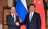 Председатель КНР встретился с российским премьером