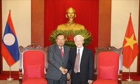 Генеральный секретарь ЦК КПВ, президент Вьетнама принял Генерального секретаря НРПЛ, Президента Лаоса