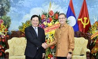 Deputi PM Vietnam, Pham Binh Minh mengucapkan Hari Raya Tahun Baru Bunpimay, Laos