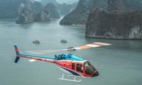 Media internasional memperkenalkan penghayatan di Teluk Ha Long dengan helikopter