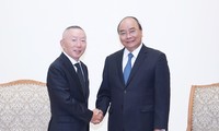 PM Nguyen Xuan Phuc menerima Presiden Grup Fast Retailing, Jepang