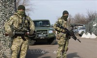 Rusia dan Jerman menginginkan agar Ukraina memberikan status khusus  kepada Donbass
