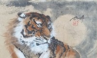 Tahun Nham Dan Nikmati Lukisan  Macan yang hidup-hidup dari Pelukis Nguyen Doan Ninh