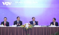 PM Vietnam dan PM Laos Bersama-sama Memimpin Simposium dengan Badan Usaha ASEAN dan Mitra