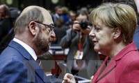 Germany's SPD pressures Merkel before talks