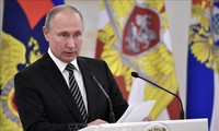 Putin urges strengthening Russia's military