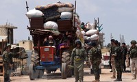 Suriah: Kira-kira 300 kaum pembangkan datang kawasan mengurangi ketegangan