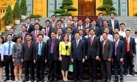President Truong Tan Sang asks enterprises to reform for international integration