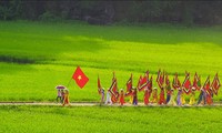 The procession ritual of Thai Vi Temple Festival