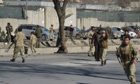 Afghanistan: dozens killed in suicide bomb targeting police headquarters 
