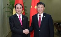 President Tran Dai Quang meets APEC leaders