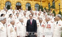 President Tran Dai Quang meets police officers deployed to the southern war front