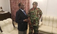 Zimbabwe's ruling ZANU-PF party calls for Mugabe resignation