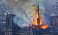 A fire that devastated Notre Dame Cathedral in Paris is under control, officials say