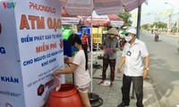Rice ATM helps Vietnam’s poor survive COVID-19 pandemic