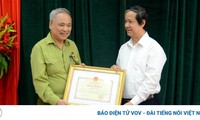 82-year-old graduate of high-school receives certificate of merit