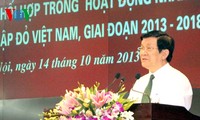 Truong Tan Sang à la signature du programme de coordination des activités humanitaires