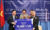 Pham Vu Luan au Laos pour promouvoir la coopération bilatérale
