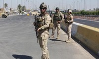 Irak : combats autour de la principale raffinerie, Kerry pousse à l'unité 