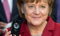 Merkel demande à Poutine le retrait total des troupes russes d'Ukraine