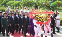 Le président Tran Dai Quang poursuit sa visite d’état au Laos