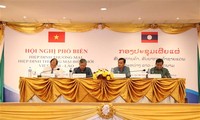 Colloque sur deux nouveaux accords du commerce Vietnam - Laos