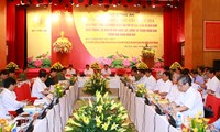 Tran Dai Quang au colloque national sur la défense et la sécurité 