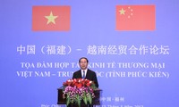 Tran Dai Quang à la table ronde sur la coopération commerciale Vietnam-Chine