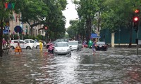 “Hoàn Kiêm sous la pluie:  Une après-midi qui tombe à l'eau?”
