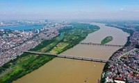 Membangun Daerah Dataran Rendah Sungai Merah Menjadi Daerah Pendorong Pembangunan Utama