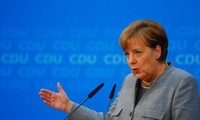 Merkel espère un accord de principe avec le SPD d'ici mi-janvier