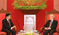 Sekjen Nguyen Phu Trong  dan PM Nguyen Tan Dung menerima Deputi PM, Menlu  Laos Thongloun Sisoulith