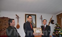 Pemerintah Laos mencatat  sumbangan perutusan diplomatik Vietnam  di Jenewa.
