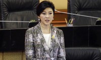 Mantan PM Thailand, Yingluck Shinawatra   dibawa ke pengadilan.