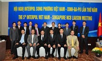 Mendorong kerjasama dalam perjuangan memberantas kriminalitas antara Interpol Vietnam dan Singapura