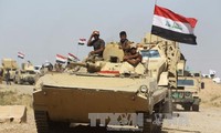 Masalah antiterorisme:  Pasukan-pasukan Irak melakukan serangan terhadap benteng  terakhir dari  IS