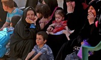 Ribuan orang  pulang kembali ke rumahnya setelah mencapai  permufakatan gencatan senjata  di Suriah Selatan