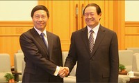 Rencontre entre Pham Binh Minh et Zhou Yongkang
