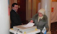 Russians vote for new president
