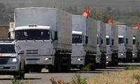 Russia, Ukraine begin to check humanitarian aid trucks