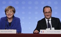French, German leaders insist migrant crisis a challenge to EU 