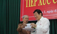 President Truong Tan Sang meets voters of HCMC’s district 1