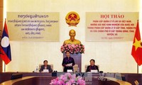 Vietnam, Laos exchange experiences in administrative management
